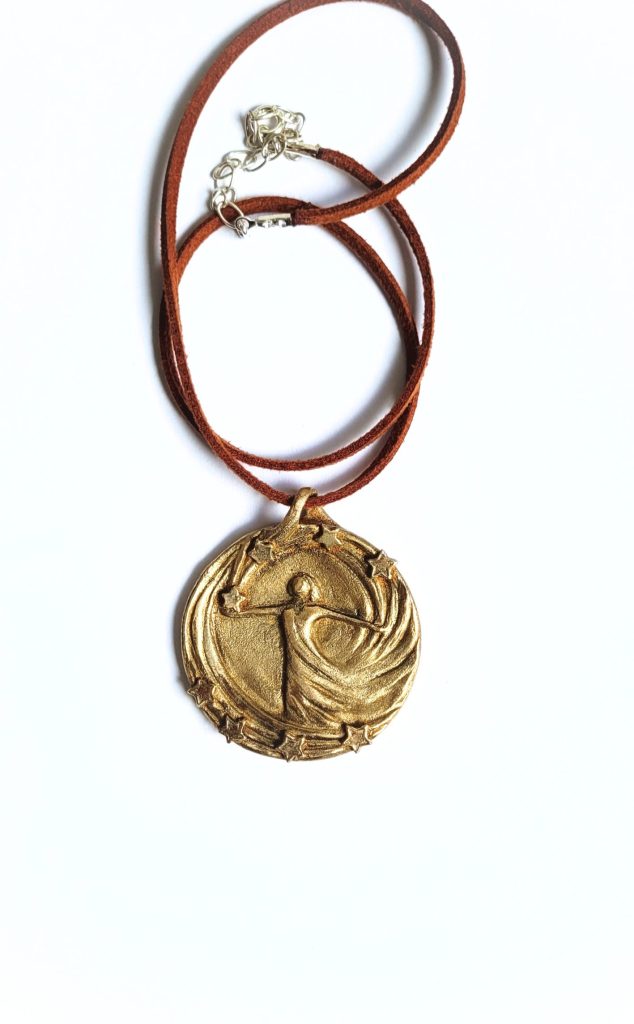 Happiness - Schmuckmedaille aus Bronze mit Sternen
